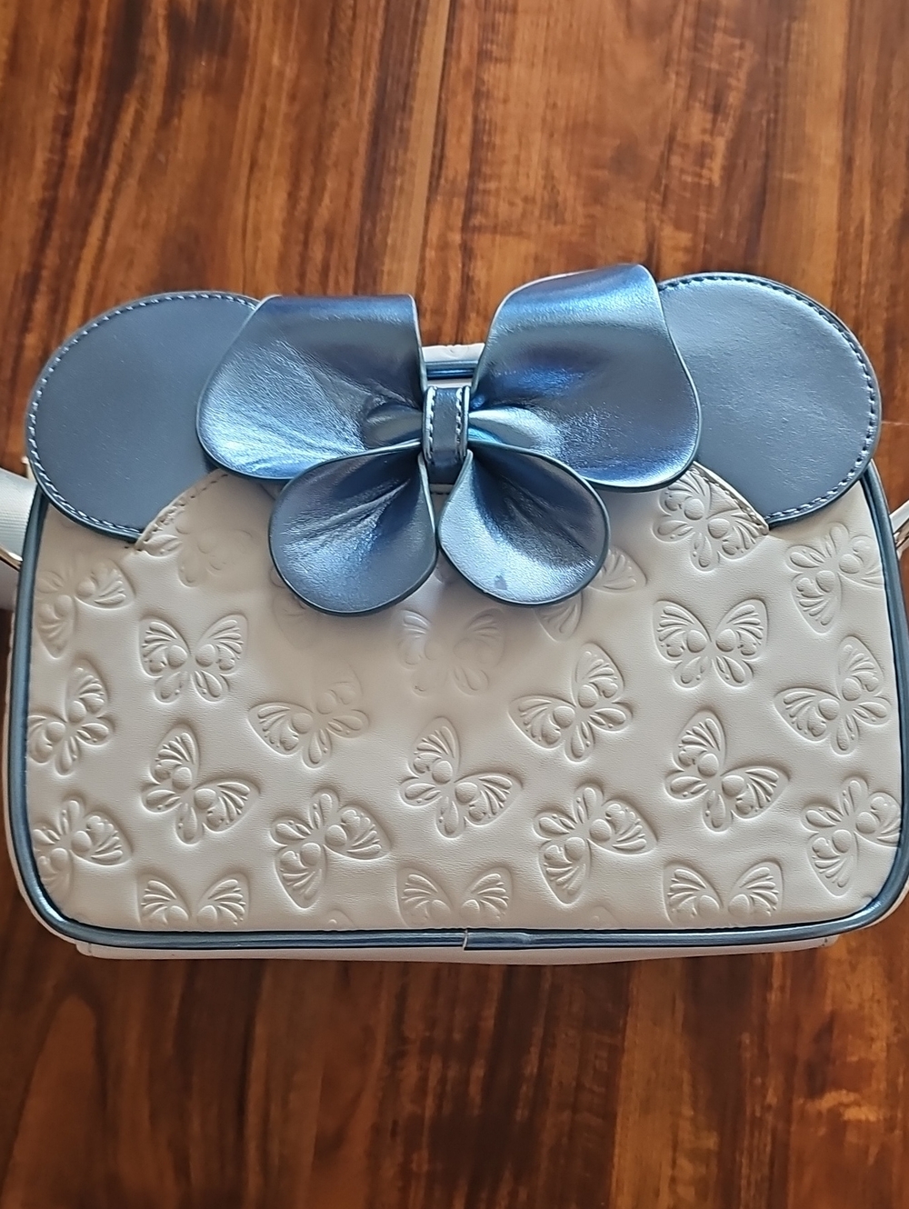 Loungefly Disney Blue Butterfly Embossed Bow Crossbody Bag